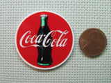 Second view of the Coca Cola Needle Minder