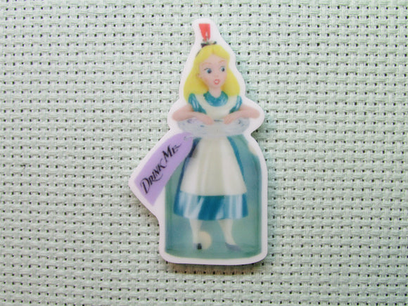 First view of the Alice in a Drink Me Bottle Needle Minder