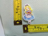 Third view of the Alice Holding the White Rabbit Needle Minder