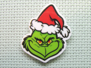 First view of the Grinch in a Santa Hat Needle Minder