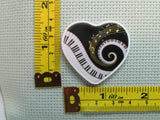 Third view of the Piano Heart Needle Minder