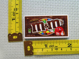 Third view of the Plain M&Ms Needle Minder