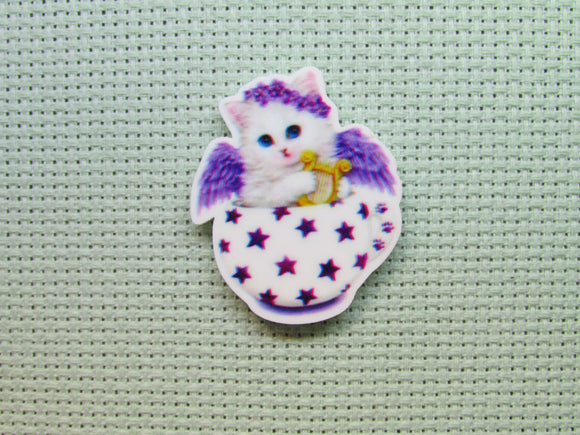 First view of the Purple Angel Kitten in a Teacup Needle Minder
