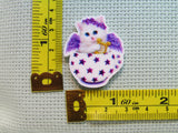 Third view of the Purple Angel Kitten in a Teacup Needle Minder