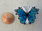 Second view of Blue and Black Swirl Butterfly Needle Minder.