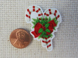 Second view of A Pair of Candy Canes Needle Minder.