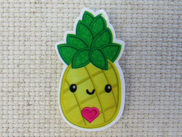 First view of Pineapple with a Cute Pink Heart Needle Minder.