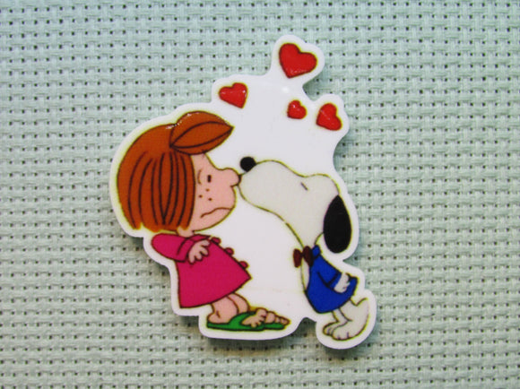 First view of the Peppermint Patty Getting a Snoopy Kiss Needle Minder