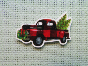 First view of the Red and Black Christmas Truck Needle Minder