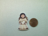 Second view of the Angel Holding a Double Heart Needle Minder