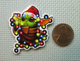 Second view of Christmas Alien child needle minder.
