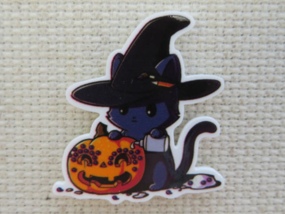 First view of Purple cat Carving a Pumpkin Needle Minder