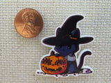 Second view of Purple cat Carving a Pumpkin Needle Minder.