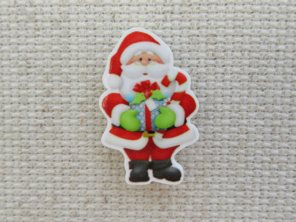 First view of Santa with a Present Needle Minder,.