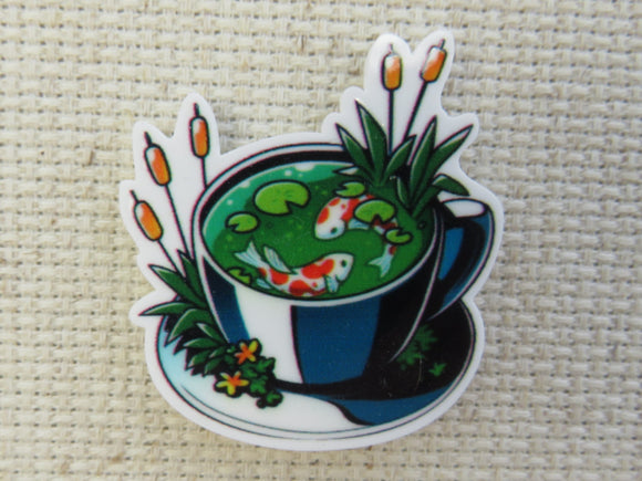 First view of A Teacup of Koi Fish Needle Minder.