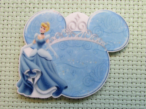 First view of the Cinderella in front of a Beautiful Blue Mouse Head Needle Minder