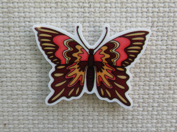First view of Autumn Colored Butterfly Needle Minder.