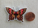 Second view of Autumn Colored Butterfly Needle Minder.
