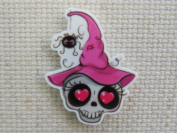 First view of Pretty in Pink Skull with Heart Eyes and a Witches Hat Needle Minder.