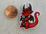 Second view of Red Dragon Hugging a Kitty Needle Minder.