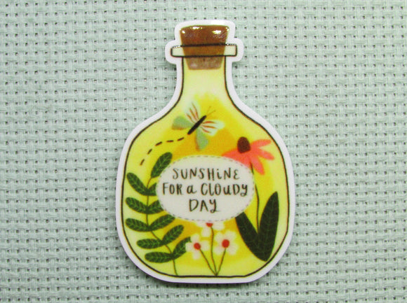 First view of the A Bottle of Sunshine Needle Minder