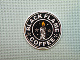 First view of the Black Flame Coffee Needle Minder