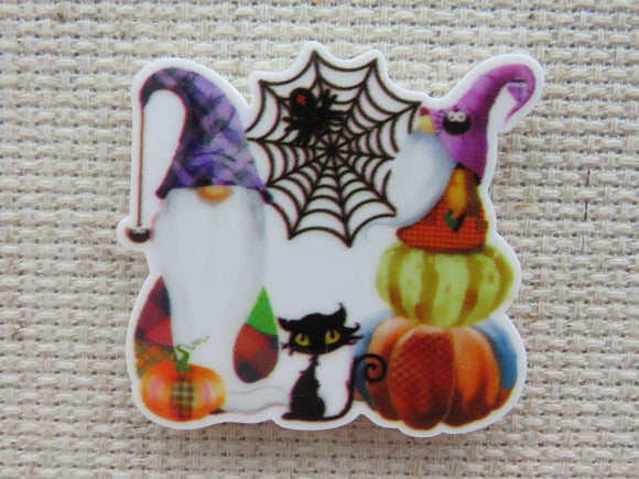 First view of A Pair of Gnomes, a Spider in a Web and a Black Cat Needle Minder.