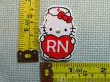 Third view of the Cute White RN Kitty Needle Minder
