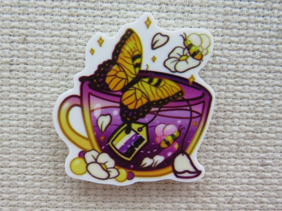 First view of Butterfly and Bee Teacup Needle Minder.