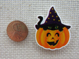 Second view of Little Black Cat Peeking out of A Happy Jack O Lantern Needle Minder.