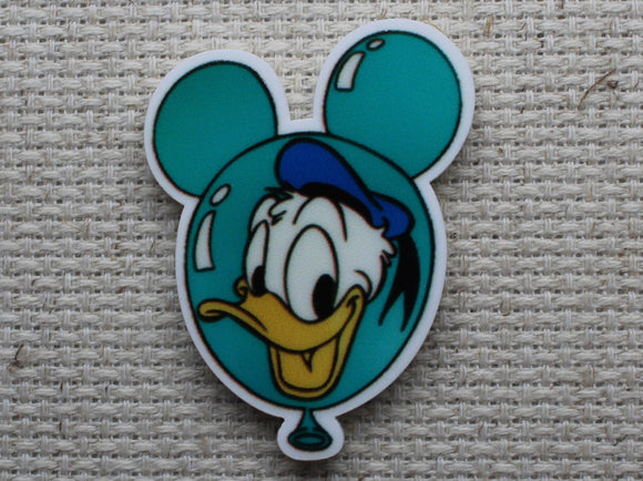 First view of Donald Duck in a mouse head balloon needle minder.