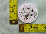 Third view of the Girls Can Do Anything Needle Minder