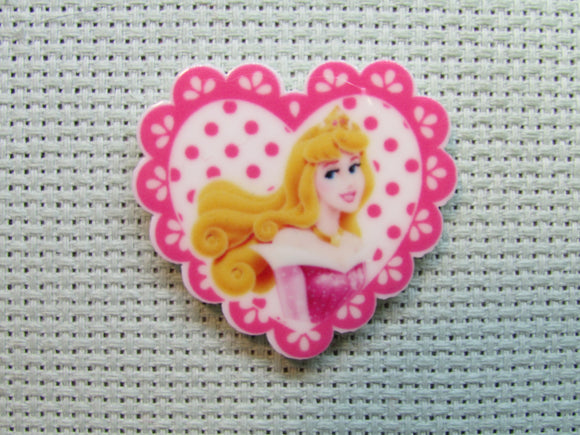 First view of the Princess Aurora from Sleeping Beauty in a Heart Needle Minder
