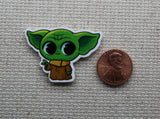 Second view of cute alien child needle minder.