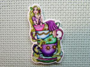 First view of the Rapunzel Sitting on a Stack of Teacups Needle Minder