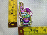 Third view of the Rapunzel Sitting on a Stack of Teacups Needle Minder