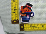 Third view of the Gingerbread Man Peeking Out of a Snowman Mug Needle Minder