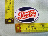 Third view of the Pepsi-Cola Needle Minder