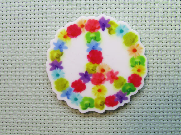First view of the Floral Peace Sign Needle Minder