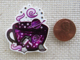 Second view of Purple Planetary Teacup Needle Minder.