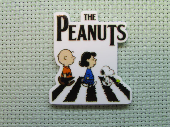 First view of the The Peanuts Imitating The Beatles Needle Minder