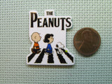 Second view of the The Peanuts Imitating The Beatles Needle Minder