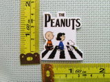 Third view of the The Peanuts Imitating The Beatles Needle Minder