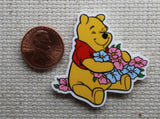 Second view of Pooh Bear Hugging Beautiful Flowers Needle Minder.