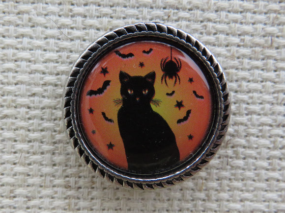 First view of Charming Cat with Bats and a Spider Needle Minder.