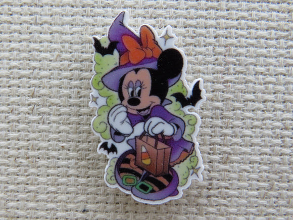 First view of Minnie Mouse as a Purple Witch Needle Minder.