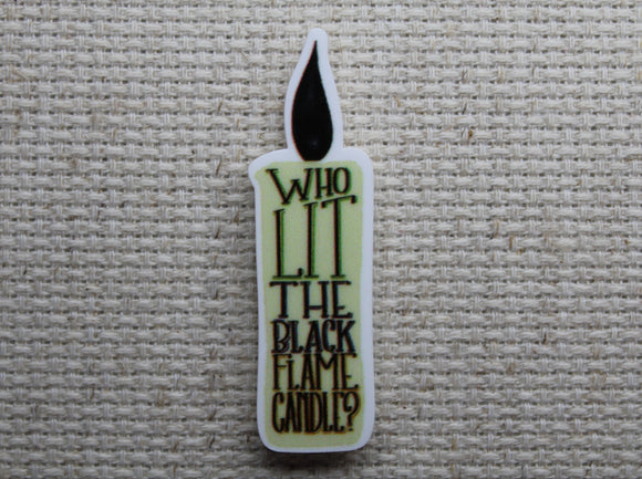 First view of Who Lit the Black Flame Candle? Needle Minder.