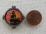 Second view of Charming Haunted House Needle Minder.