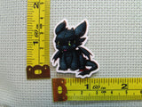 Third view of the Toothless Needle Minder
