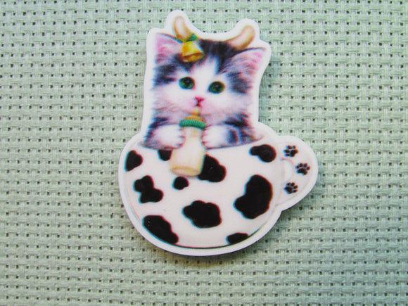 First view of the Cute Kitty in a Teacup Dressed as a Cow Needle Minder